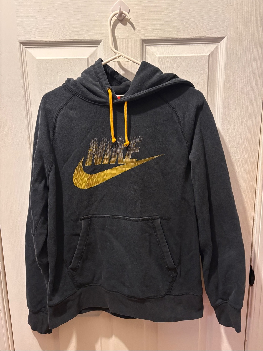 Nike Black Pullover Hoodie with Yellow Logo and Drawstrings
